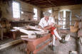 A carpenter making furniture