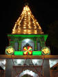 Picture of a Hindu temple decorated with lights